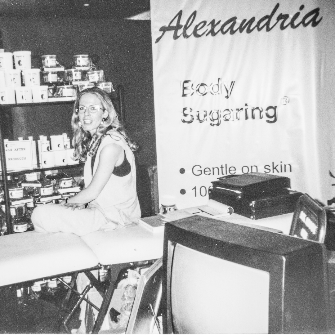 black and white photo of Lina at an Alexandria Body Sugaring booth in 1991 when she was only a distributor with the brand