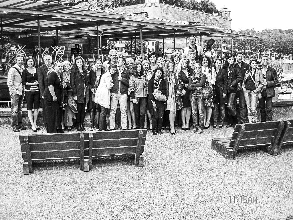 black and white photo of Lina and her distributors all posing outdoors at the Alexandria Professional distributor conference held in Switzerland