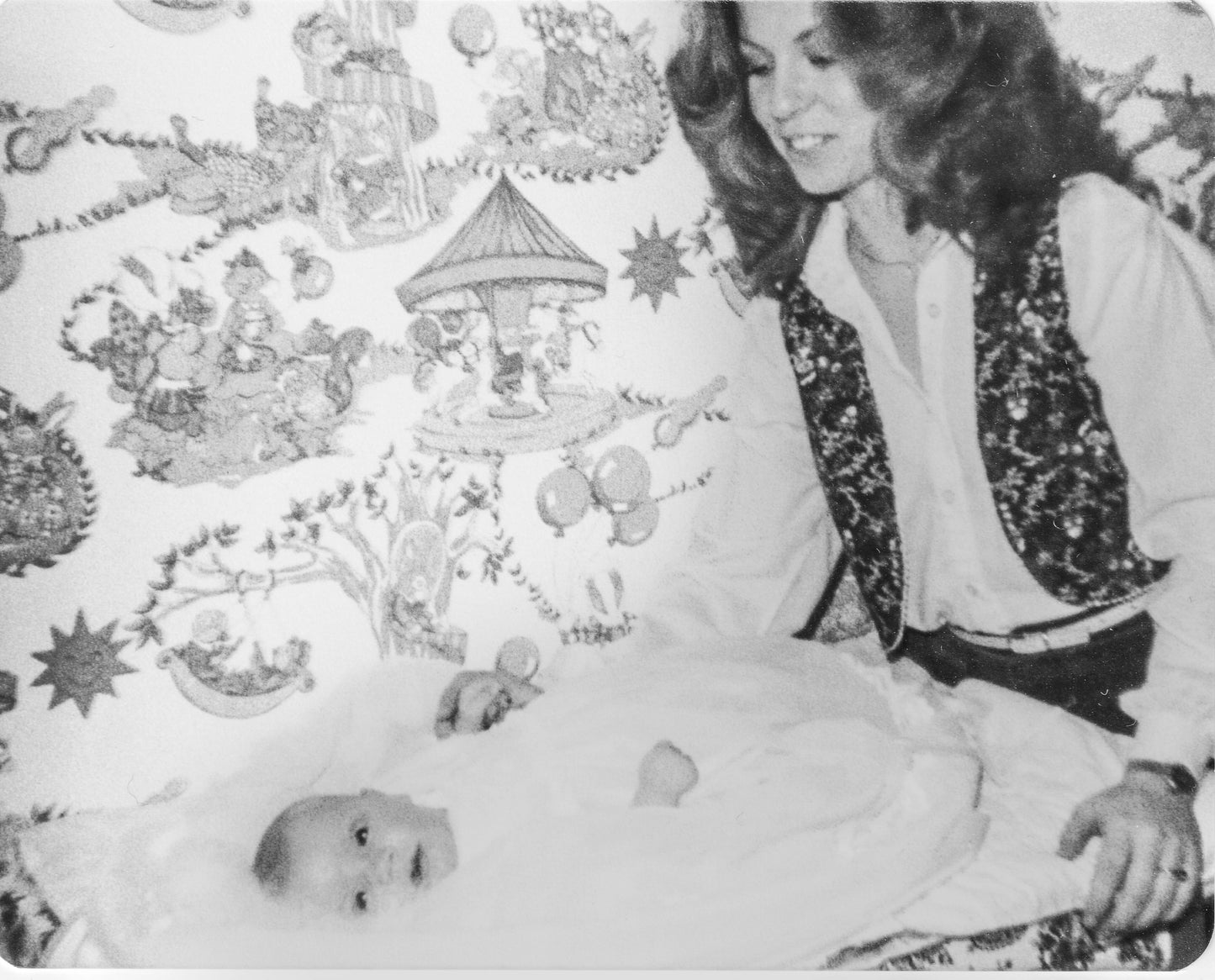 black and white photo of Lina and her newborn son