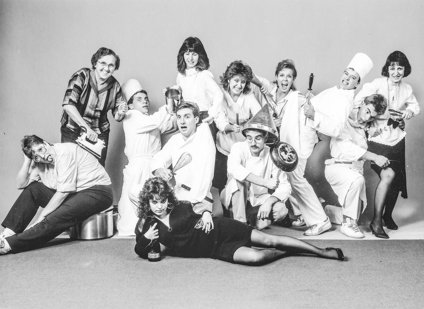 black and white photo of Lina and coworkers from the Rinderlin restarant acting silly